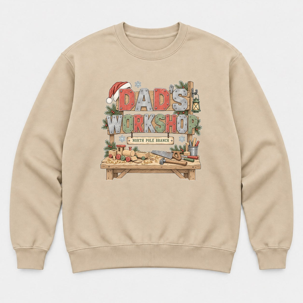 Dad's Workshop North Pole Branch Christmas Graphic T-Shirt & Sweatshirt - Sweatshirt Sand Front