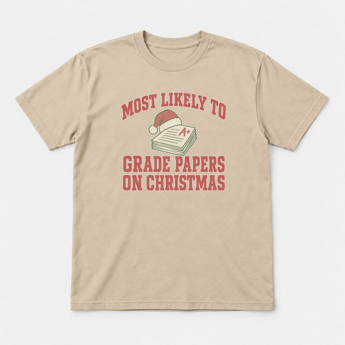 Most Likely To Grade Papers On Christmas Retro Teacher Graphic T-Shirt & Sweatshirt - Tshirt Sand Front