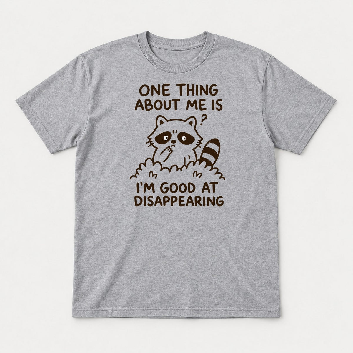 One Thing About Me Is I'm Good At Disappearing Funny Raccoon Graphic T-Shirt & Sweatshirt - Tshirt Sport Grey Front