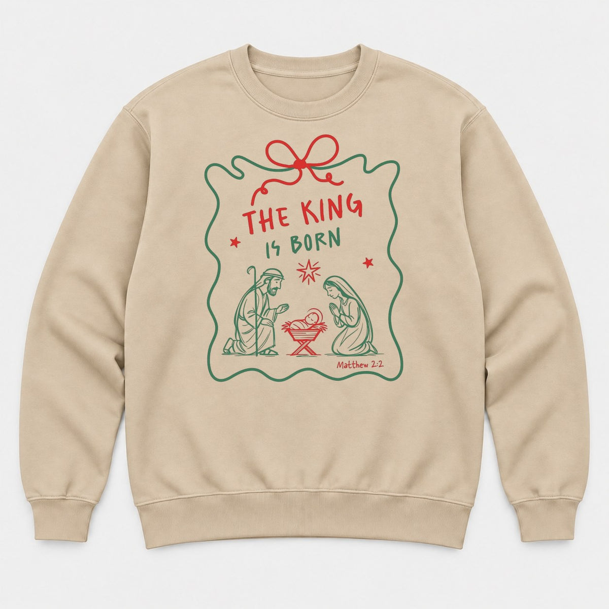 The King Is Born Nativity Scene Christmas Graphic T-Shirt & Sweatshirt - Sweatshirt Sand Front